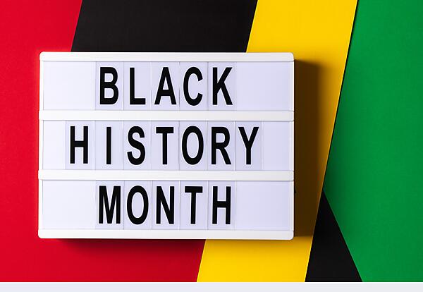 words Black History Month on red, black, yellow, and green background