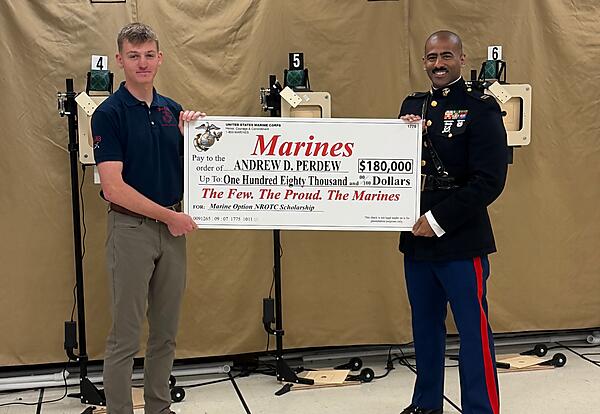 Andrew Perdew and Captain Alain Carrasco