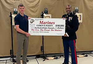 Andrew Perdew and Captain Alain Carrasco