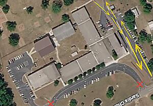 Areal image of J.M. Odom with arrows showing the parent drop-off and pick-up route.