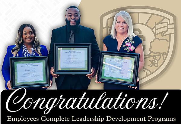 Dr. Gistacy Brown, Brian Knighton, and Jennifer Turnbull at their graduation ceremony for the  Georgia School Superintendent Association District Office Professional Development Program.
