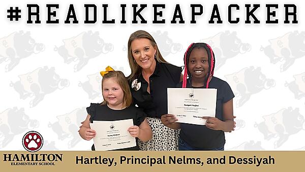 photo with two students and principal