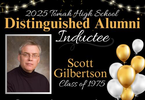 2025 Distinguished Alumni Inductee photo with confetti and balloons