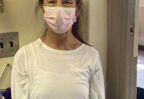 Mrs. Marina Donovan, wearing a face mask