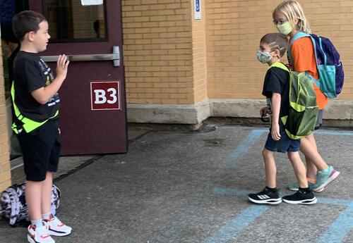 Child arriving for school