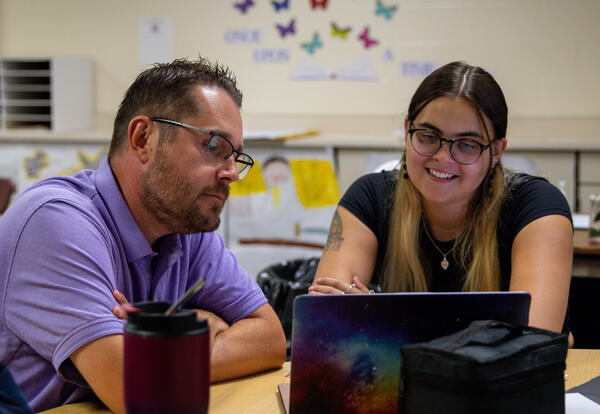 Teachers reviewing material together