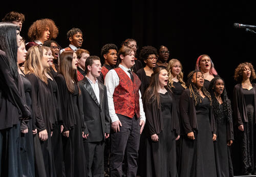 The high school choir performs