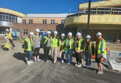 Staff touring school
