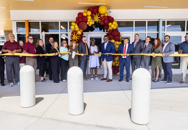 Dignitaries cut the ribbon at the ceremony