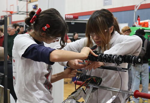 Students working on robot Quagsire
