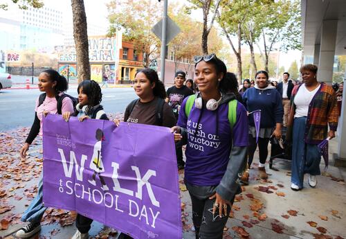 Students walking to school for Ruby Bridges Walk to School Day