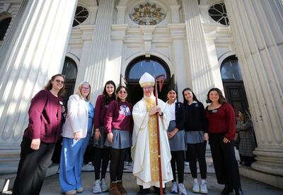 ND Campus Ministers and students with Bishop Cantu
