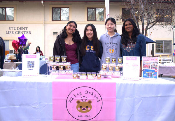 Students showing their product at the Night Market