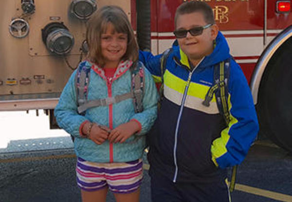 Winter Raffle Winner Arrives at School in a Fire Truck