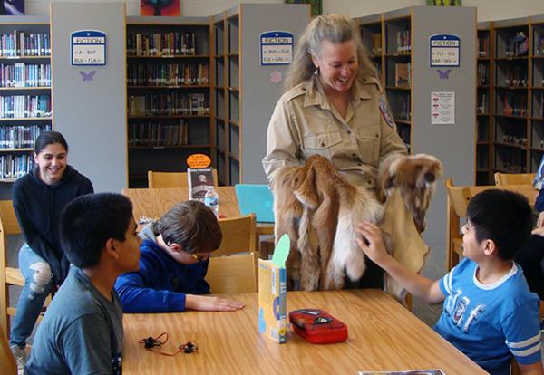 Sixth Grade Scientists Discuss Animal Adaptations