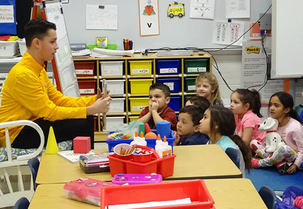Andrew Athletes Read with Millennium Students