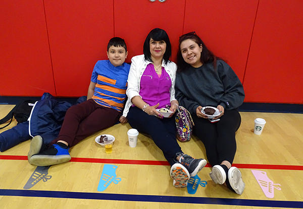 Families enjoying breakfast