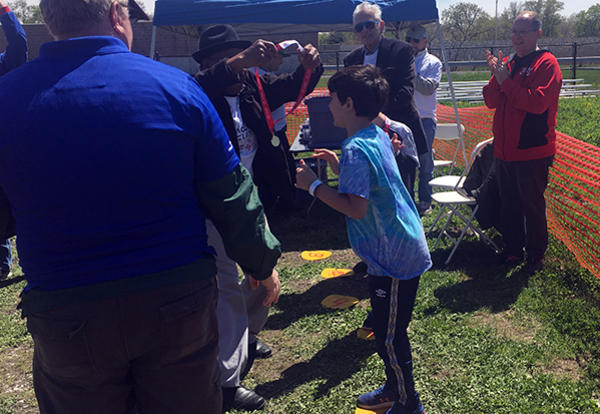 athlete receiving gold medal
