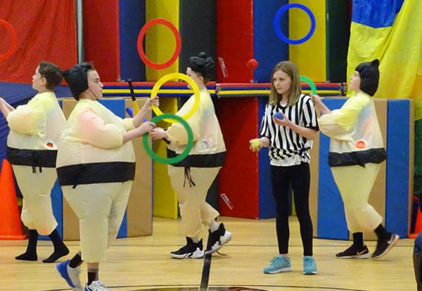 students participating in juggling show