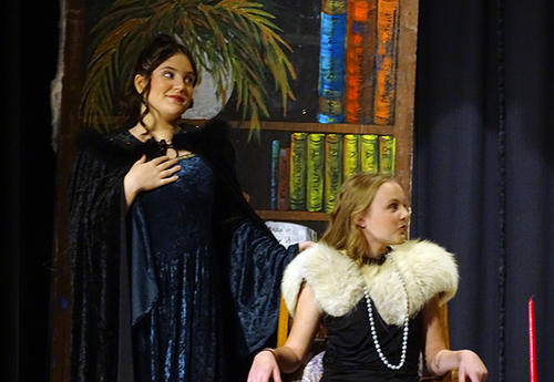 two students on stage