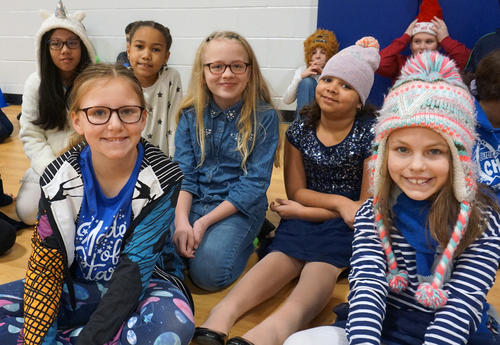 smiling students sitting together