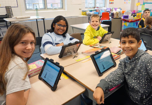 smiling students in class