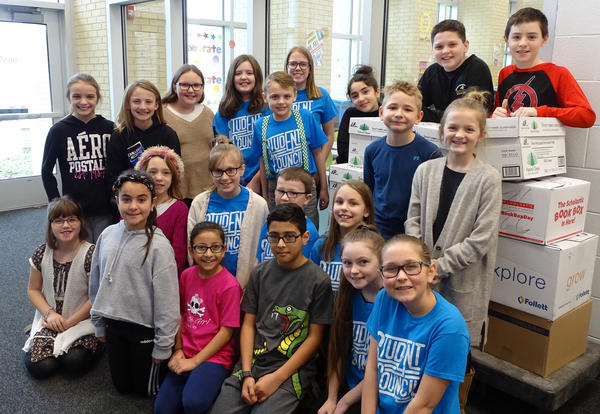students with boxes of food