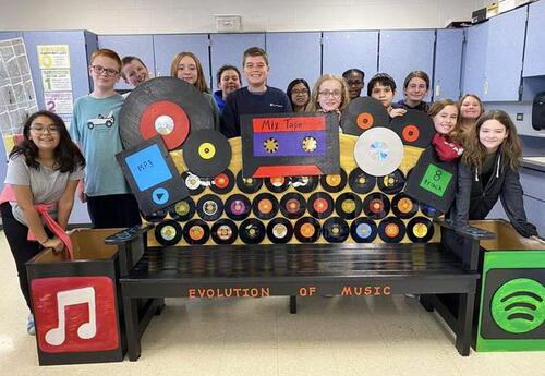 Grissom Art Club with Evolution of Music Bench