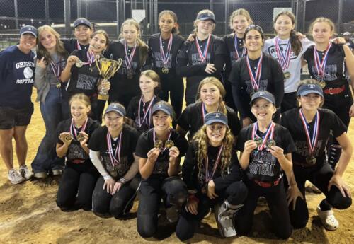 Grissom Girls' Softball team pose proudly after winning SWIC Tournament