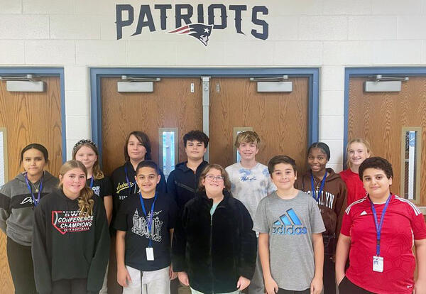 November Students of the month pose for group picture