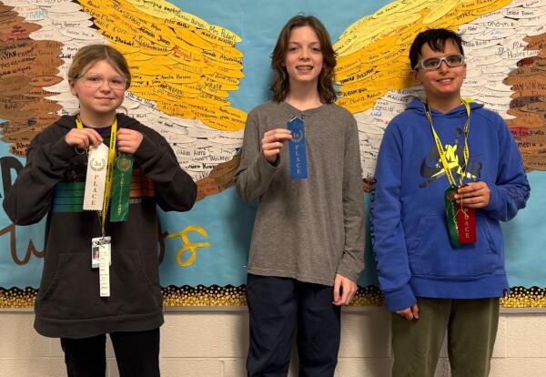 Prairie View Spelling Bee winners pose proudly with ribbons