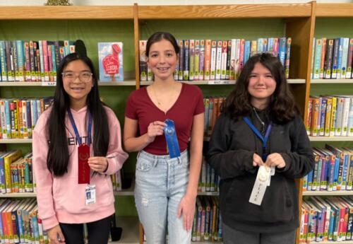 Grissom Spelling Bee winners pose proudly with ribbons