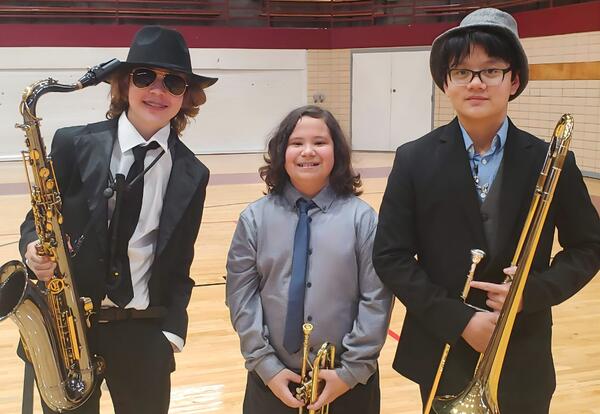 KSD 140 Jazz Band students pose proudly with instruments at 2025 ILMEA Jazz Festival