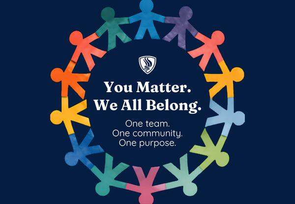 You Matter. We All Belong. One Team. One Community. One Purpose. Written under KSD 140 flame logo surrounded by different colored paper cutouts of people on dark blue backgorund