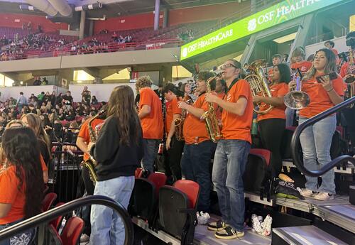 KHS Pep Band performing on bleachers