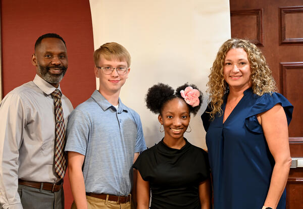 SHS Principal, Dr. Watress Harris, Rotary September Students of the Month Gabe Wubben and Carmen Hollinshed, and Rotary September Teacher of the Month Stephany Watson