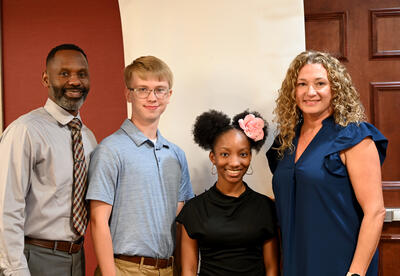 SHS Principal, Dr. Watress Harris, Rotary September Students of the Month Gabe Wubben and Carmen Hollinshed, and Rotary September Teacher of the Month Stephany Watson