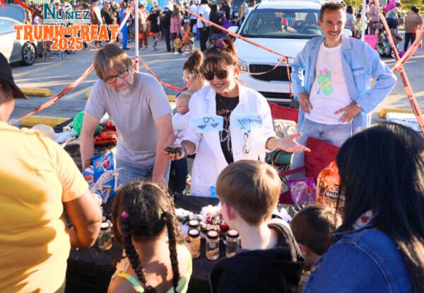 Nunez science faculty host a table at last year's trunk or treat.