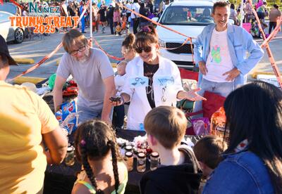 Nunez science faculty host a table at last year's trunk or treat.