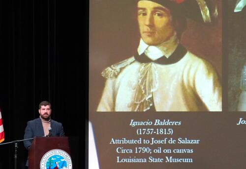 A visiting scholar presents during the Battle of New Orleans Historical Symposium.