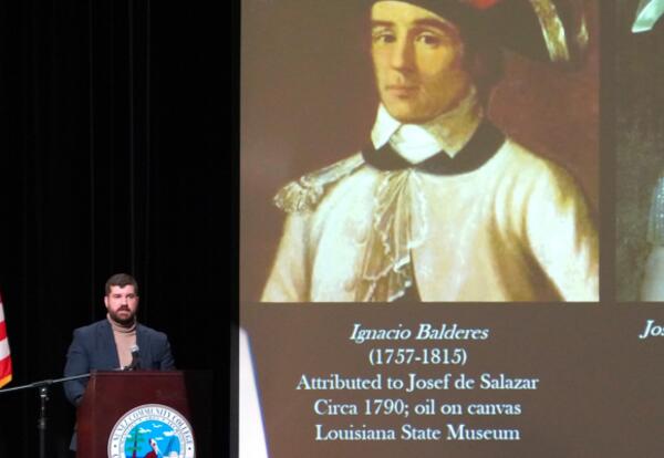A visiting scholar presents during the Battle of New Orleans Historical Symposium.