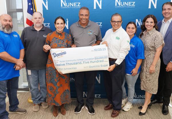 Representatives from ASR Group® present a $12,500 donation at the Nunez Community College Foundation’s Fall 2025 Scholarship Breakfast.