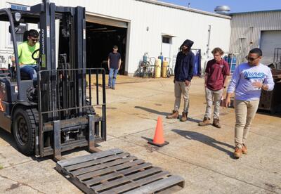 A Nunez instructor leads a forklift certification class.