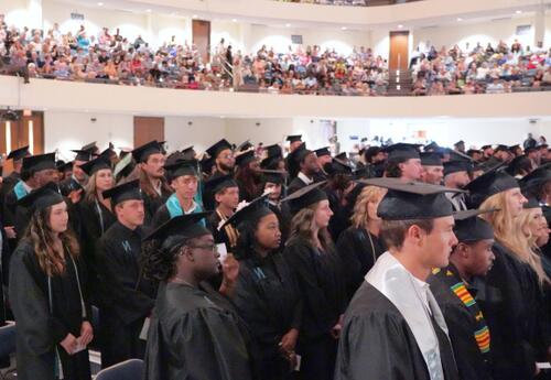 Graduates attend a Nunez Community College Commencement Ceremony