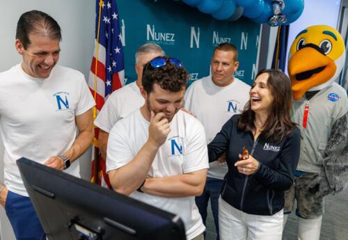 Nunez staff react to the successful launch of the Artemis II mission during a watch party in the STCCC