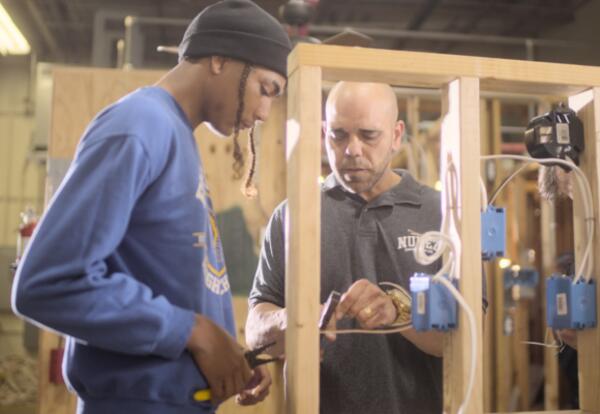 Nunez Community College Instructor, Steve Baiamonte, teaches a student in Electrical Construction, a program in which Nunez offers three different certificates and degrees. Electrical, construction, and HVAC trainings will all be enhanced at Nunez with th
