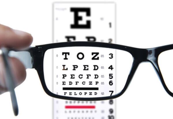 eyeglasses and exam chart