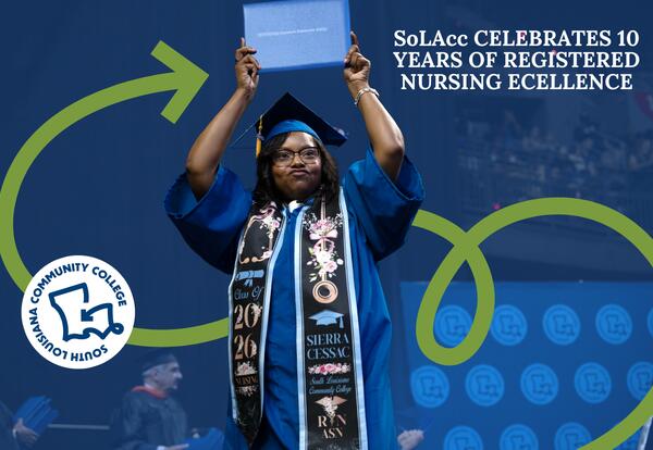 Student holding diploma