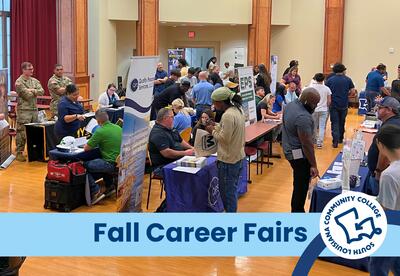 Students at a career fair, text says, "Fall Career Fairs"