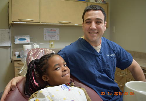 Dr. Nicholas Katchen with a Port Jervis student
